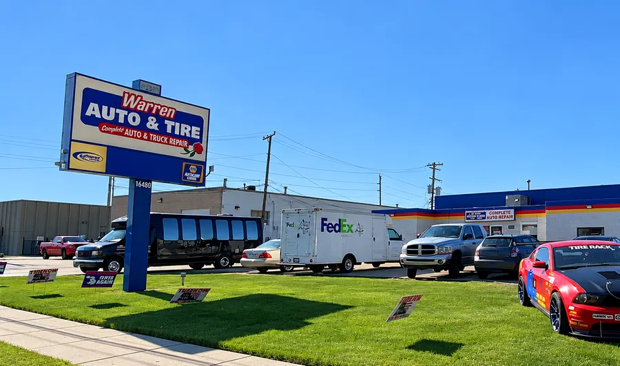 The shop and its roadside sign on 13 Mile Road